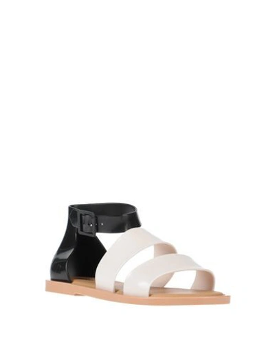 Shop Melissa Sandals In Beige