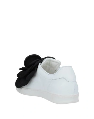 Shop Pokemaoke Sneakers In White