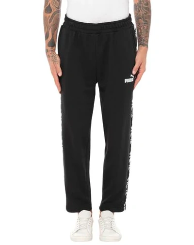 Shop Puma 3/4-length Shorts In Black