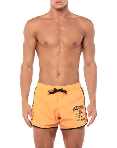 Shop Moschino Swim Trunks In Orange