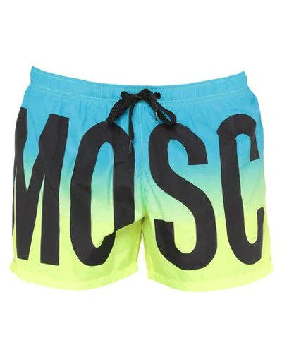 Shop Moschino Swim Trunks In Azure