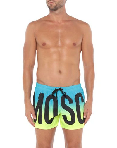 Shop Moschino Swim Trunks In Azure