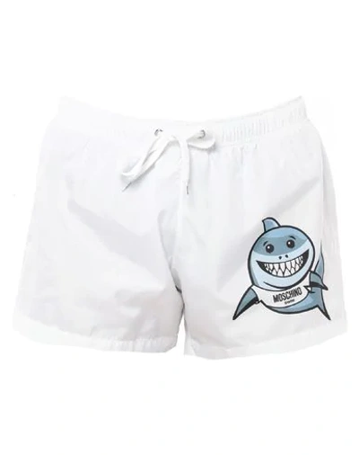 Shop Moschino Swim Trunks In White