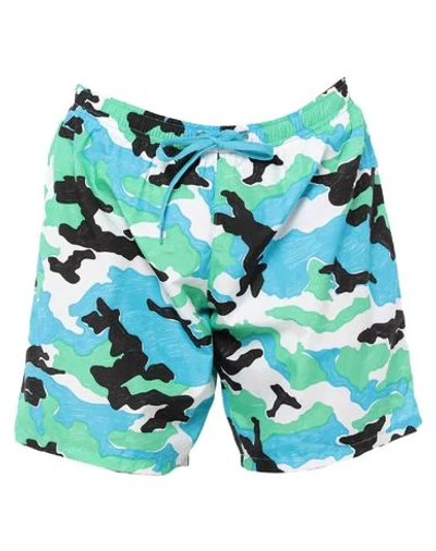 Shop Moschino Swim Trunks In Light Green