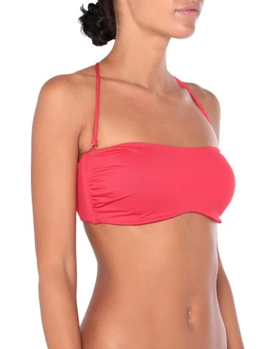 Shop Moschino Bikini Tops In Red