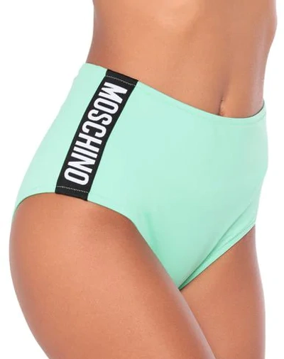 Shop Moschino Bikini Bottoms In Light Green