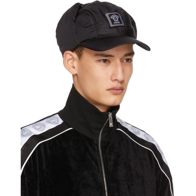 Shop Versace Black Ear Cover Cap In A1008 Black