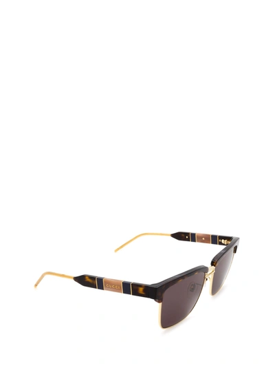 Shop Gucci Men's Green Metal Sunglasses