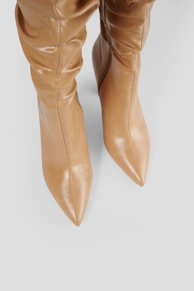 Shop Na-kd Slouchy Shaft Knee Boots - Beige In Caramel