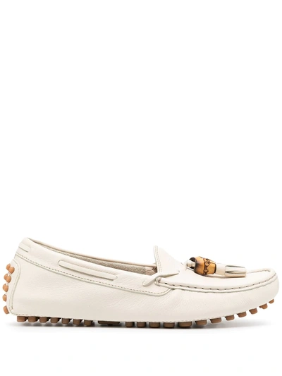 Shop Gucci Pebbled Tassel Loafers In White