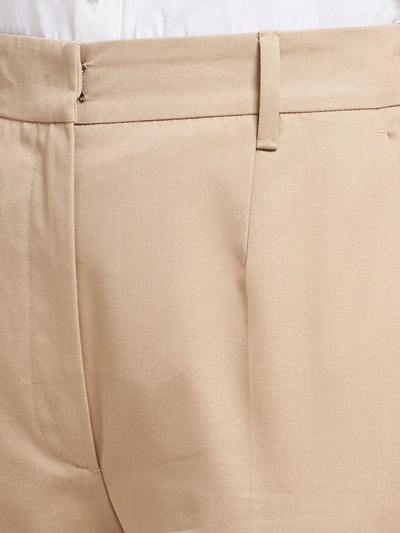 Shop Prada High-waisted Flared Trousers In Neutrals