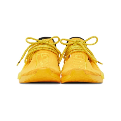 Shop Adidas Originals By Pharrell Williams Yellow Hu Nmd Sneakers In Gold/yellow