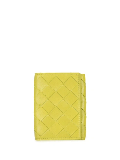 Shop Bottega Veneta Intrecciato Woven Tri-fold Purse In Green