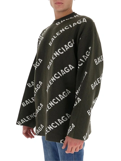 Shop Balenciaga All Over Logo Sweater In Green