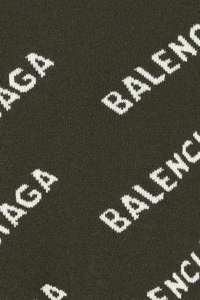 Shop Balenciaga All Over Logo Sweater In Green