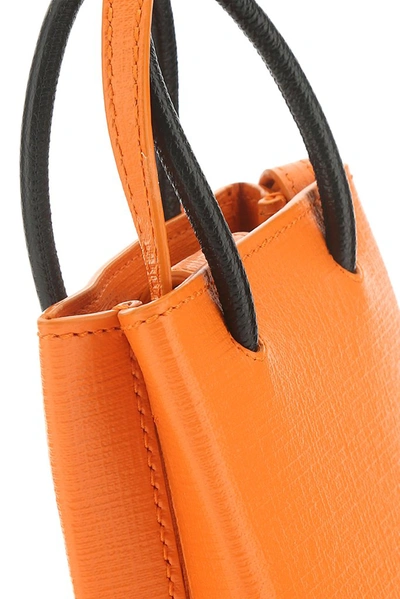 Shop Balenciaga Shopping Phone Holder Tote Bag In Orange
