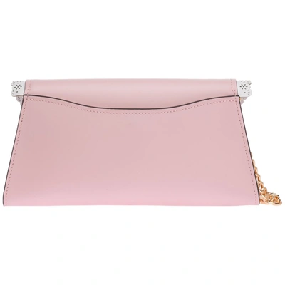 Shop Moschino Logo Icing Effect Clutch Bag In Pink