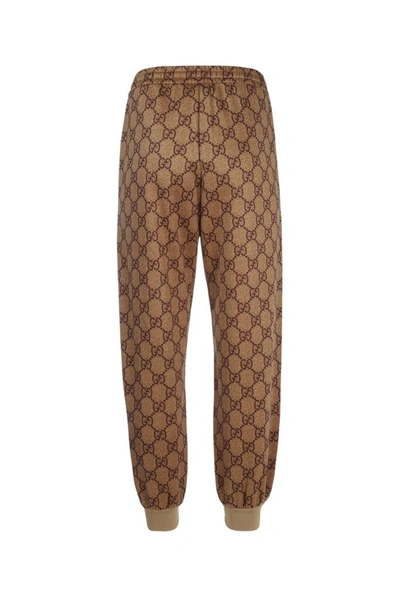 Shop Gucci Gg Drawstring Jogging Pants In Brown