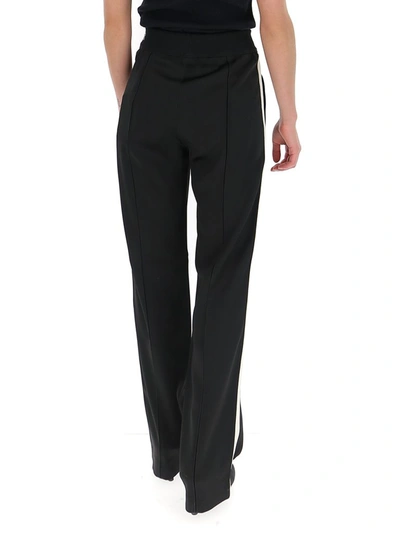 Shop Moncler Elasticated Side Band Trousers In Black