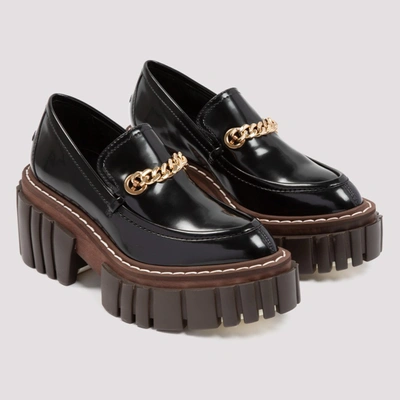 Shop Stella Mccartney Chain Embellished Loafers In Black