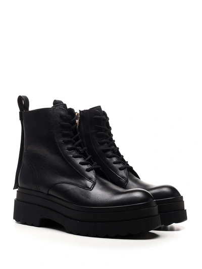 Shop Red Valentino Redvalentino Lace Up Combat Boots In Black