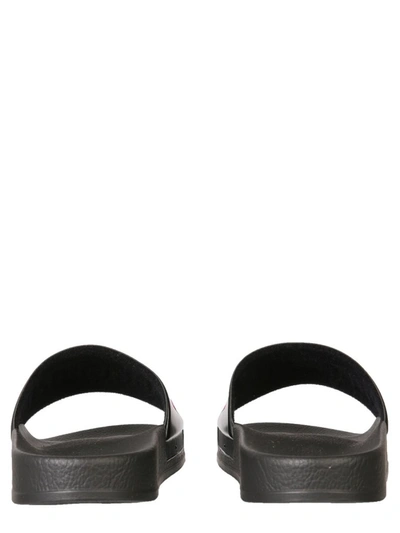 Shop Moschino Logo Slides In Black