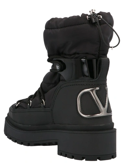 Shop Valentino Vlogo Print Winter Boots In Black