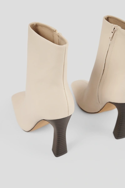 Shop Na-kd Flared High Heel Boots - Beige