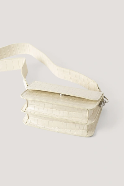Shop Na-kd Wide Strap Slim Crossbody Bag - Offwhite In Natural