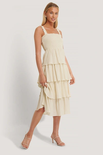 Shop Afj X Na-kd Smocked Flowy Midi Dress - Beige In Sand Stone