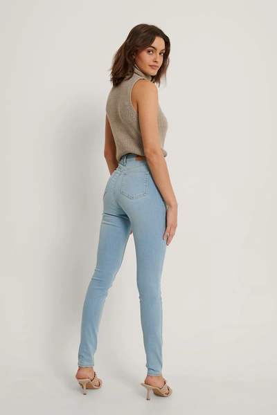 Shop Na-kd Reborn Organic Skinny High Waist Jeans Tall Blue In Light Blue