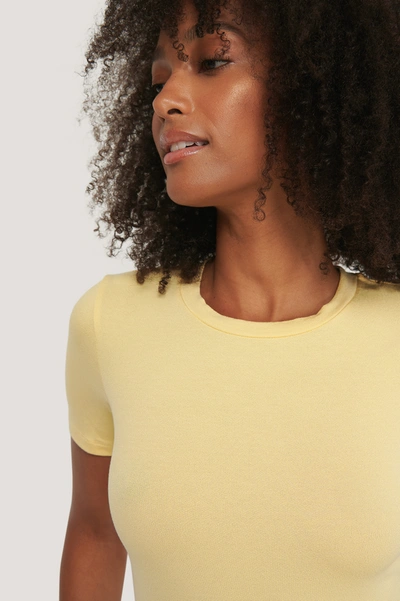 Shop Na-kd Reborn Roundneck Tight Fit Basic T-shirt - Yellow In Light Yellow