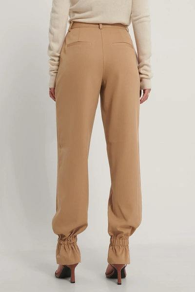 Shop Gine Margrethe X Na-kd Suit Pants With Elastic - Brown In Nougat