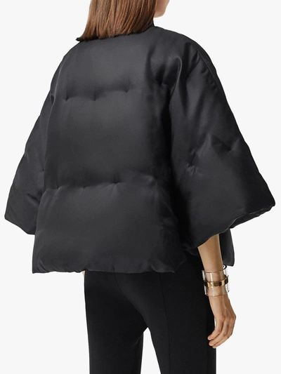 Shop Burberry Silk Twill Puffer Cape In Black