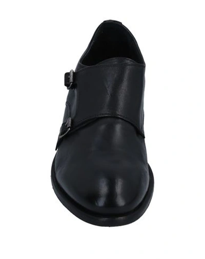 Shop Guess Loafers In Black