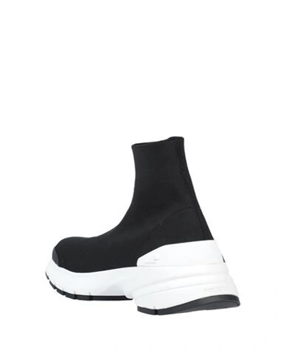 Shop Neil Barrett Sneakers In Black