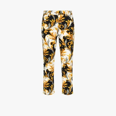 Shop Versace Acanthus Print Cropped Jeans In White