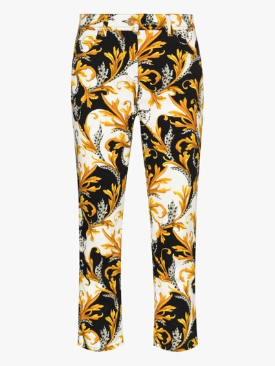 Shop Versace Acanthus Print Cropped Jeans In White