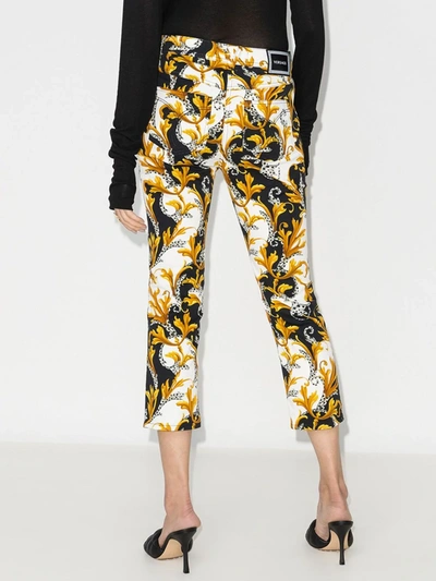 Shop Versace Acanthus Print Cropped Jeans In White