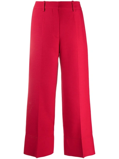 Shop Valentino Cropped Virgin Wool Trousers In Red