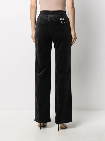 Shop Emporio Armani Embroidered Bear Straight Trousers In Black