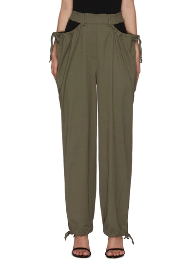 Shop Dion Lee Gathered Tie Hollow Out Pants In Green