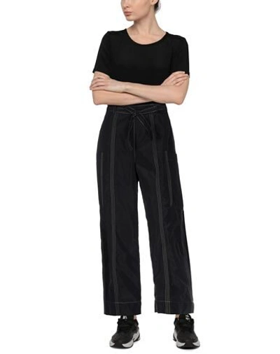 Shop Ganni Pants In Black