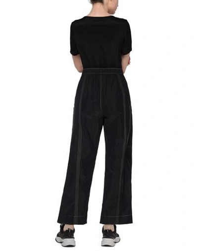 Shop Ganni Pants In Black