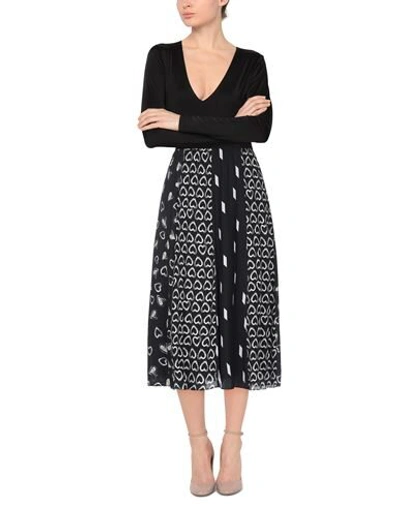 Shop Alice And Olivia Midi Skirts In Black