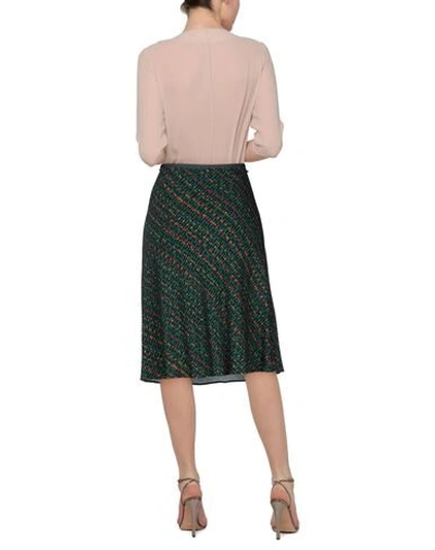 Shop Siyu Knee Length Skirts In Dark Green