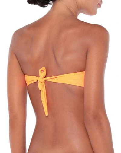 Shop Moschino Bikini Tops In Orange