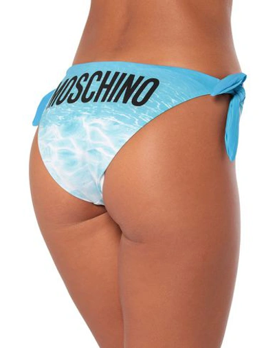 Shop Moschino Bikini Bottoms In Azure