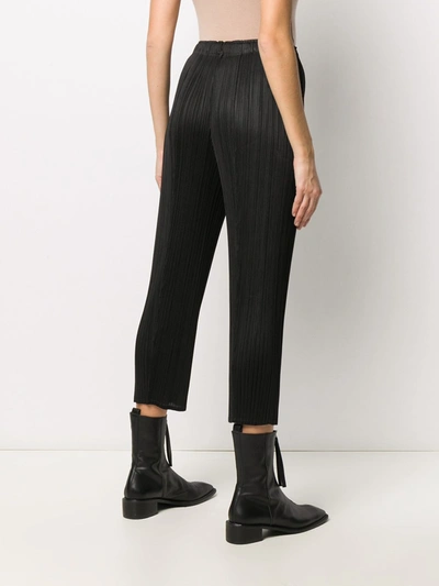 Shop Issey Miyake Trousers In Black