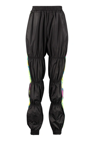 Shop Gcds Side Logo Stripe Track-pants In Black